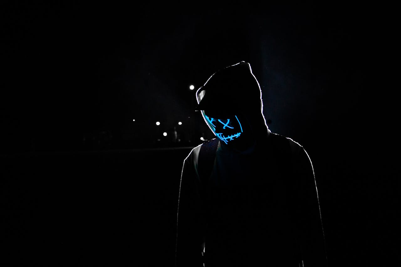 Anonymous mask icon on a dark background representing account privacy