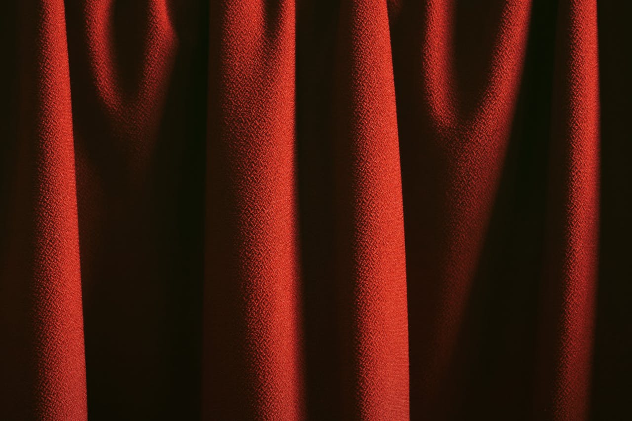 Shield icon protecting a personal email inbox from spam and tracking